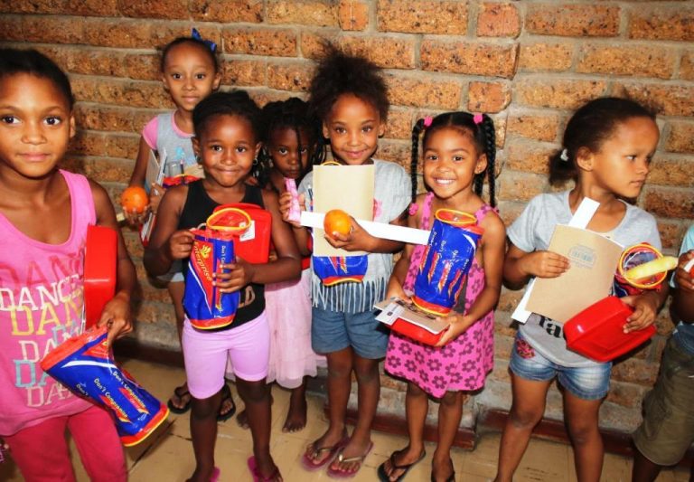 Happy Children with stationery
