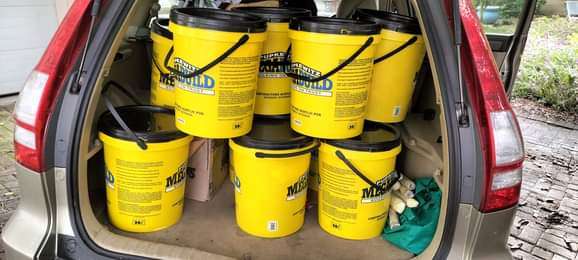 Buckets of donated food