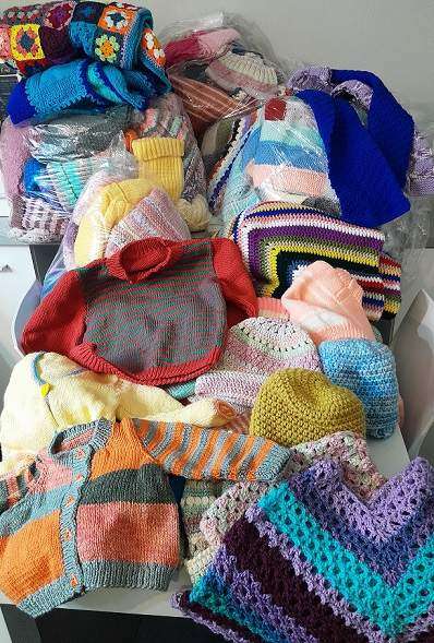 Magnificent knitted jerseys, blankets, ponchos, hoodies, scarves and soft dolls