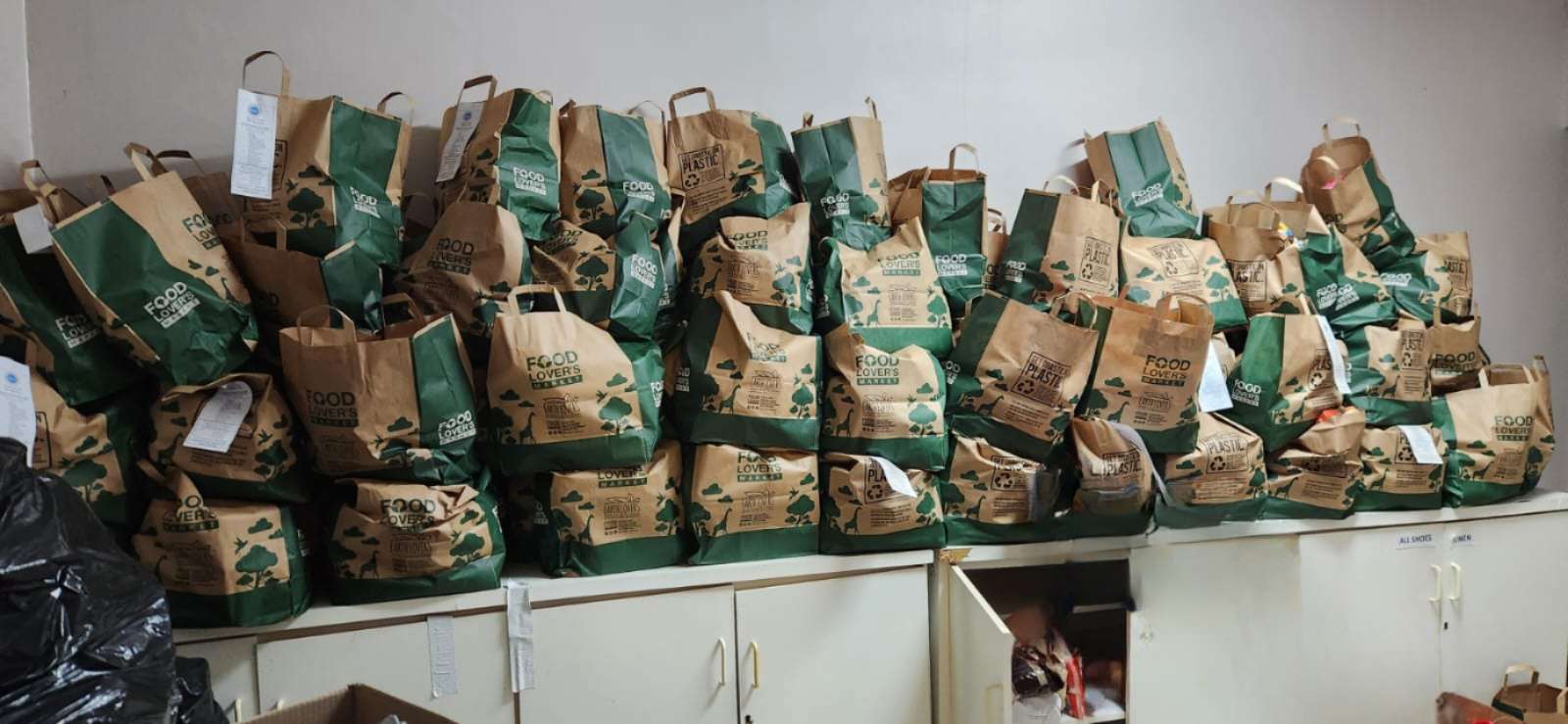 Store room full with bags stacked three deep and four high
